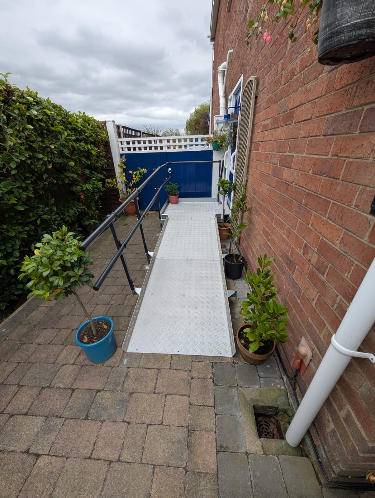 Full view of ramp installation showing access from pavement to front door