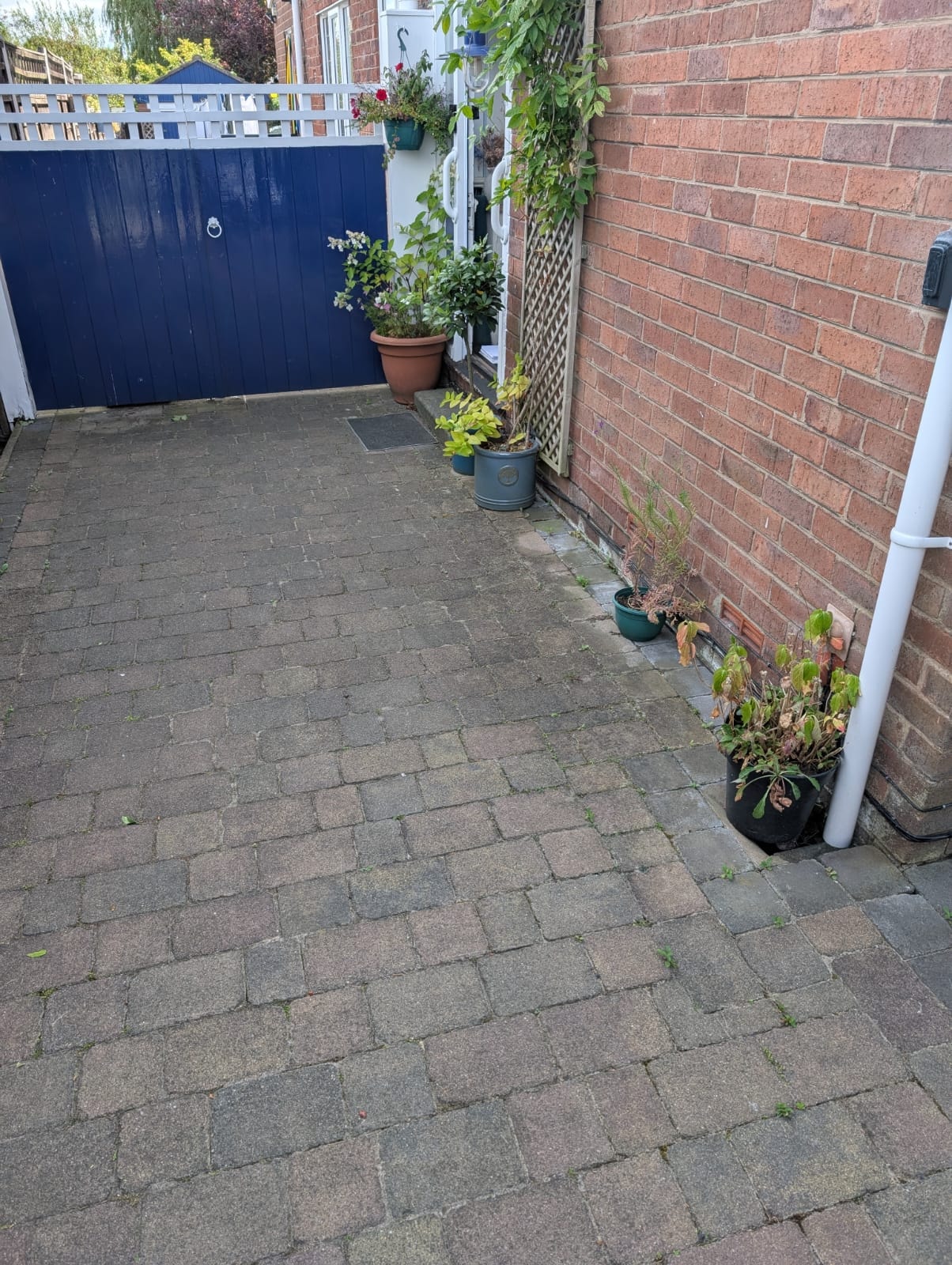 Residential entrance before installation — raised step with no wheelchair access
