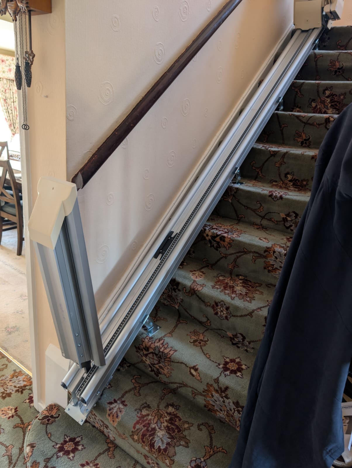 Brooks T700 stairlift with powered hinge and powered swivel installed in Wigan