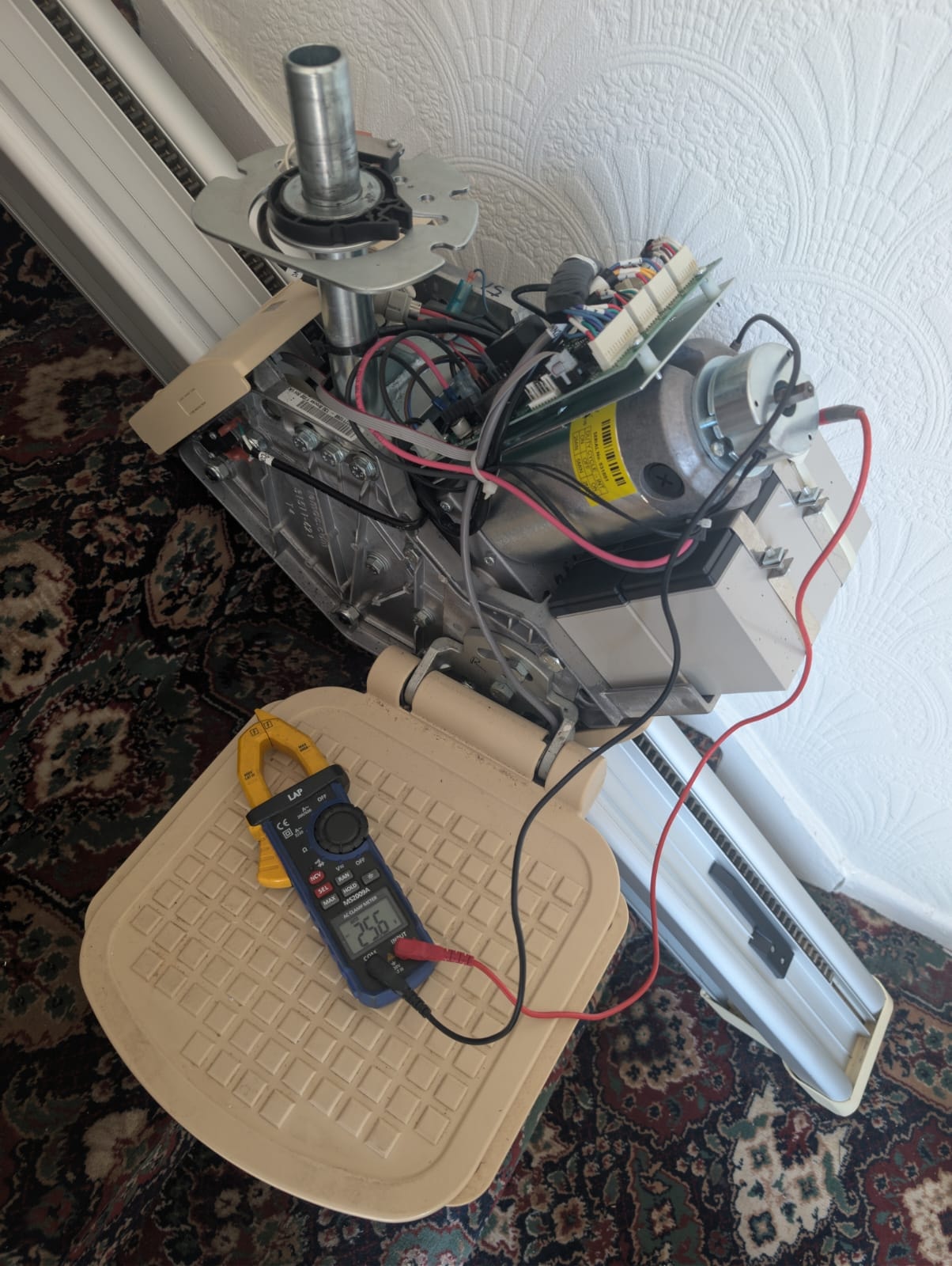 Battery and charge rate test using clamp meter during annual stairlift service