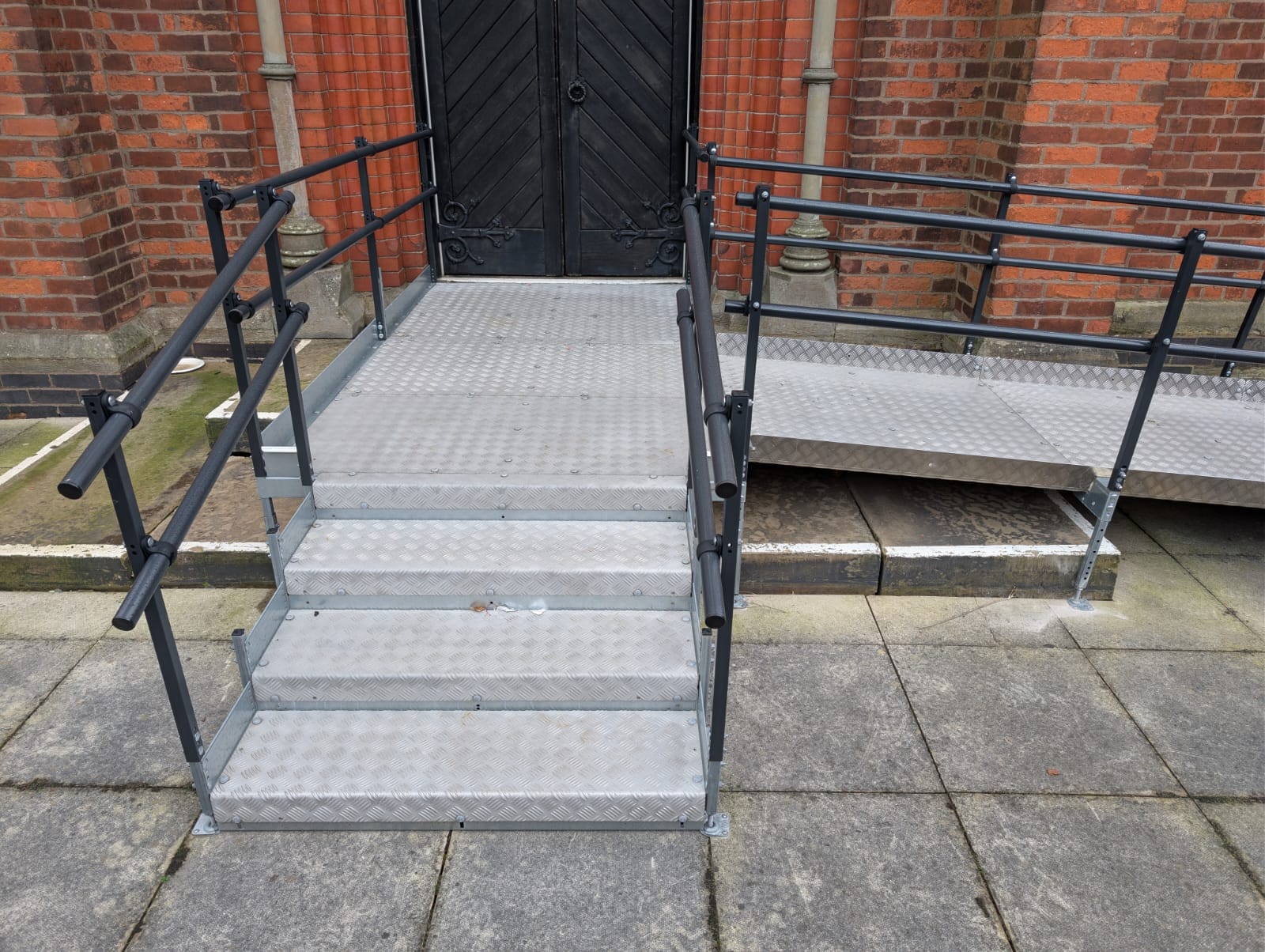 Full view of completed ramp installation at church entrance